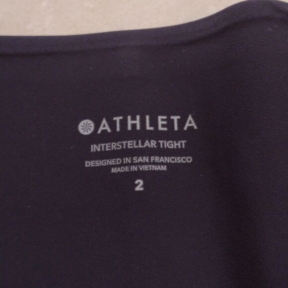 Athleta Interstellar Tight maroon red pants w split leg zip side high rise 2 - Picture 5 of 9